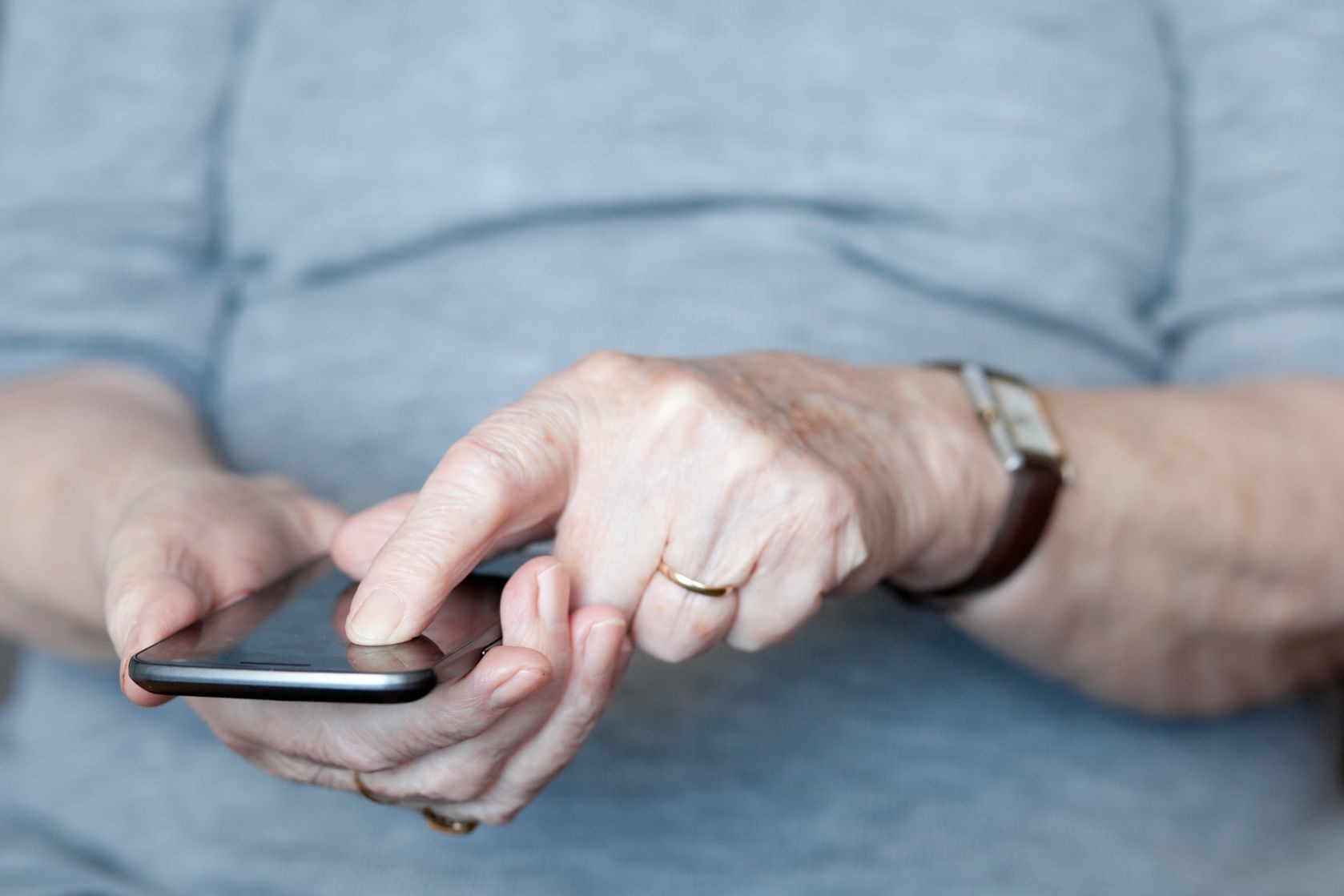 older woman using smarthphone