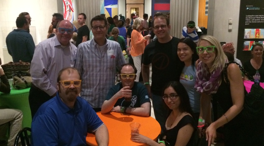 photo of Hanson employees enjoying the opening party of the Toledo Museum of Art video game exhibit